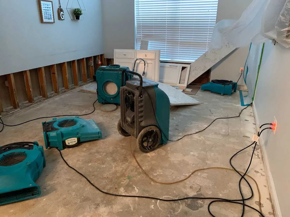 Dehumidifier in flood-cut room for Water Damage Restoration in Warren